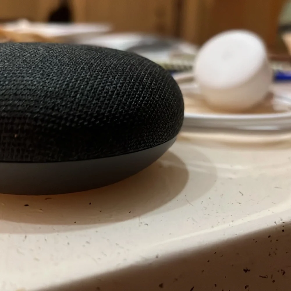 Google home mini. Dark grey. With cable. Everything works great. New (no box)